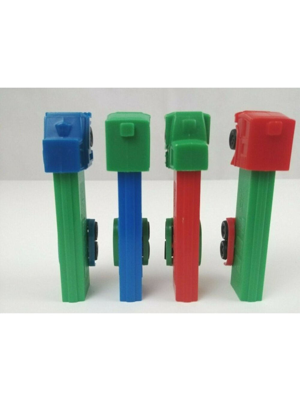 Vintage Lot of 4 Semi Truck Pez Dispensers Different Colors & Trucks (B)
